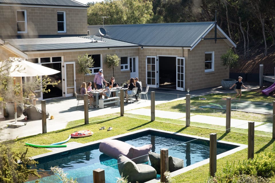 Outdoor entertaining area with mineral pool & spa, trampoline & kids cubby house