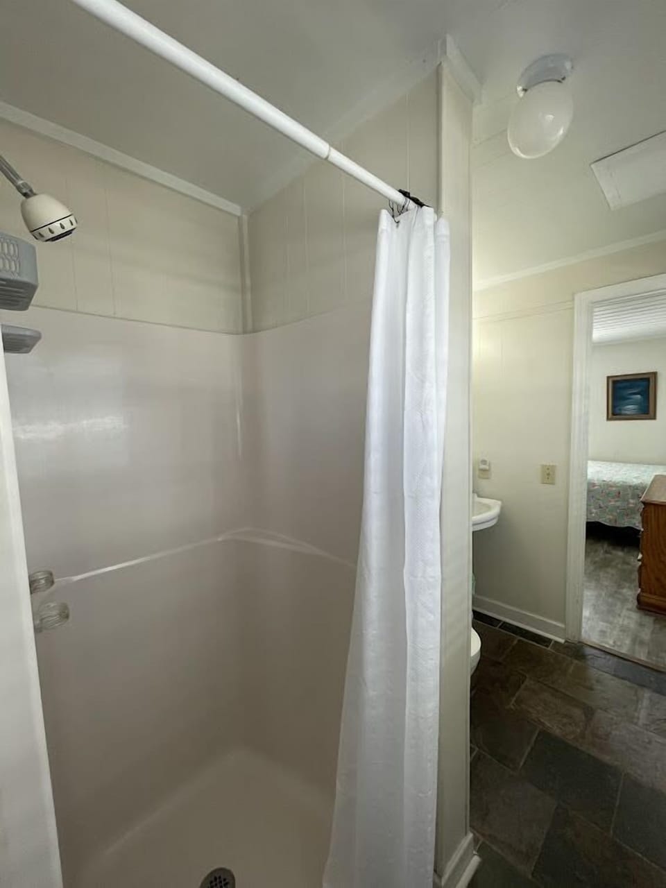 Bath shared between bedrooms 3 and 4