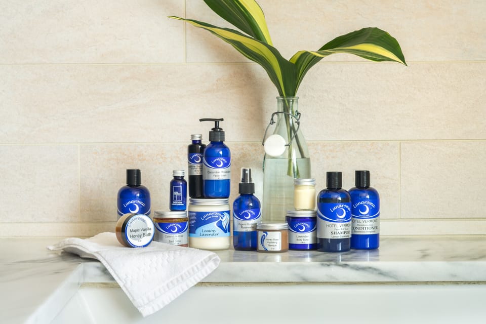 Deluxe Room, Multiple Beds | Bathroom amenities | Free toiletries, hair dryer, bathrobes, towels