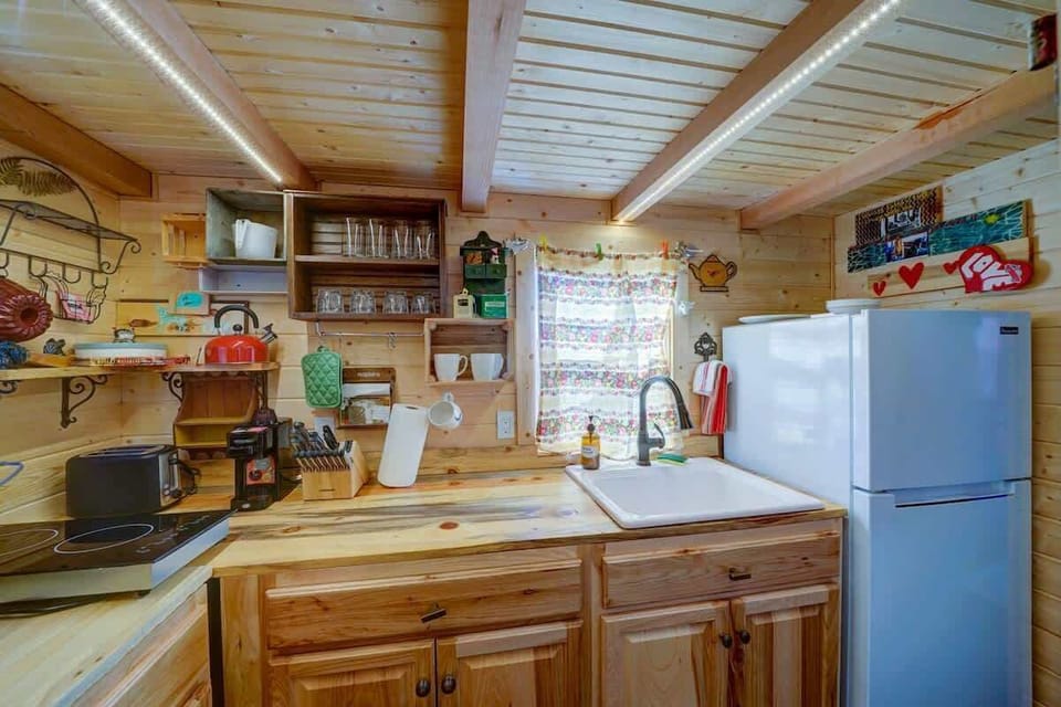 Two-burner electric cooktop, a toaster, and a coffee maker.