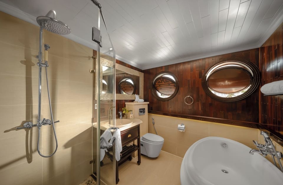 Au Co Suite | Bathroom | Designer toiletries, hair dryer, bathrobes, slippers
