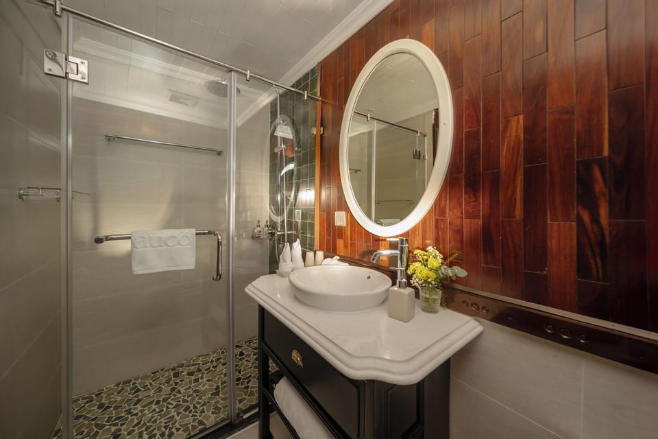 Designer toiletries, hair dryer, bathrobes, slippers