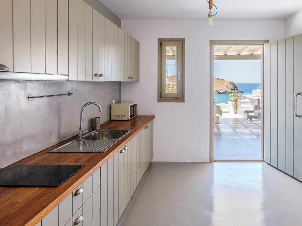 Panoramic Apartment, Hot Tub, Sea View | Private kitchen | Fridge, microwave, stovetop, espresso maker