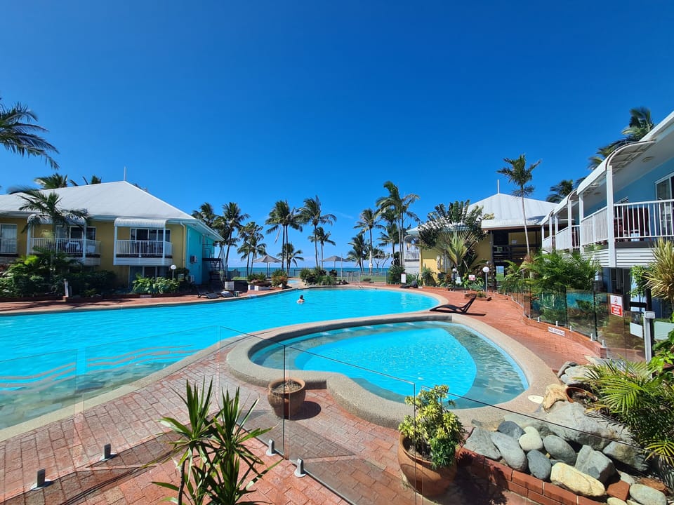 View from the Pool overlooking the beach and the Whitsunday Islands! 