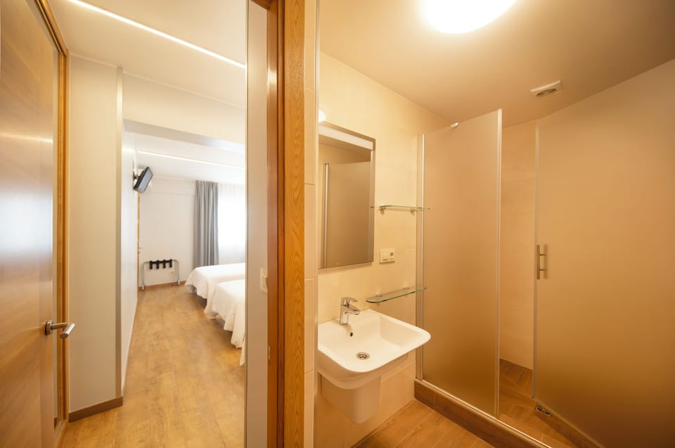 Quadruple Room | Desk, laptop workspace, blackout drapes, iron/ironing board