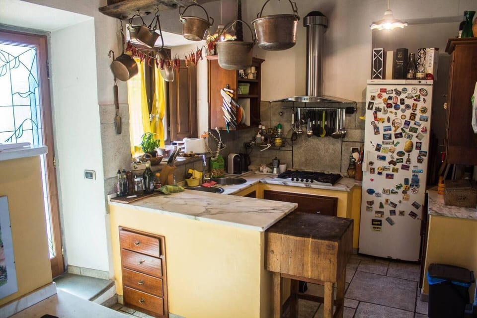 Villa | Private kitchen | Fridge, microwave, oven, stovetop