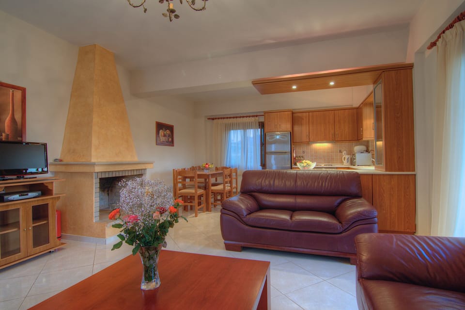 The living room has a flat screen TV.