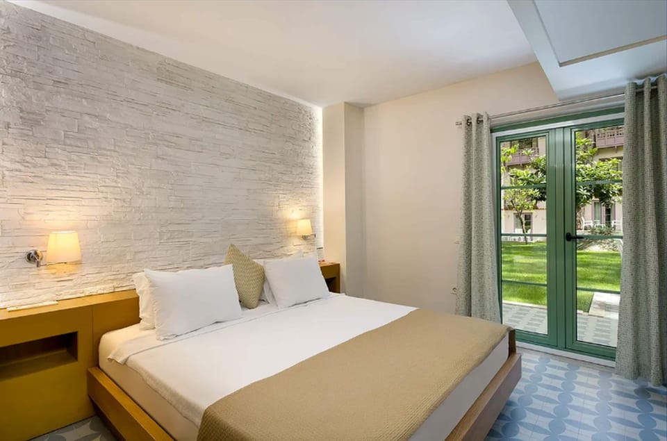 Standard Triple Room, Garden View | Premium bedding, free minibar, in-room safe, desk
