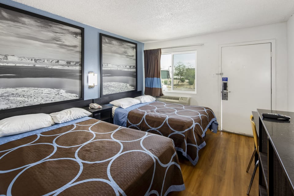 Desk, blackout drapes, bed sheets