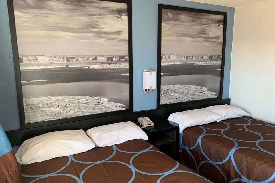 Desk, blackout drapes, bed sheets