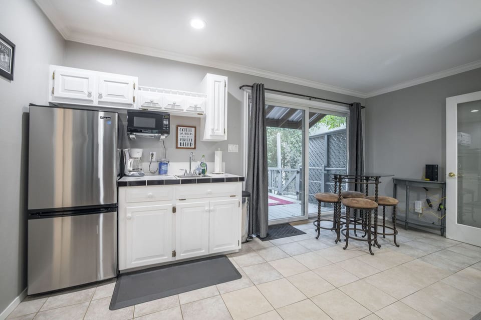 Upstairs kitchenette + deck access