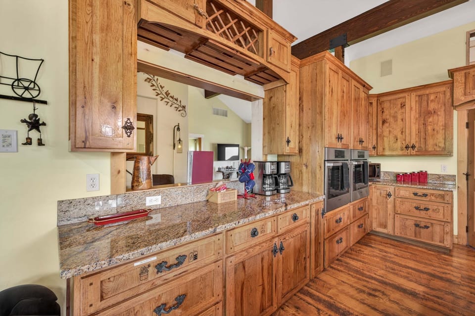 Kitchen main level with window to living room so you're always in the loop