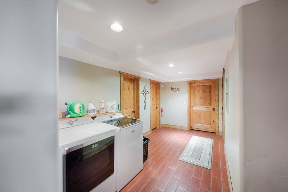 Lower level laundry.  2nd washer and dryer upstairs.