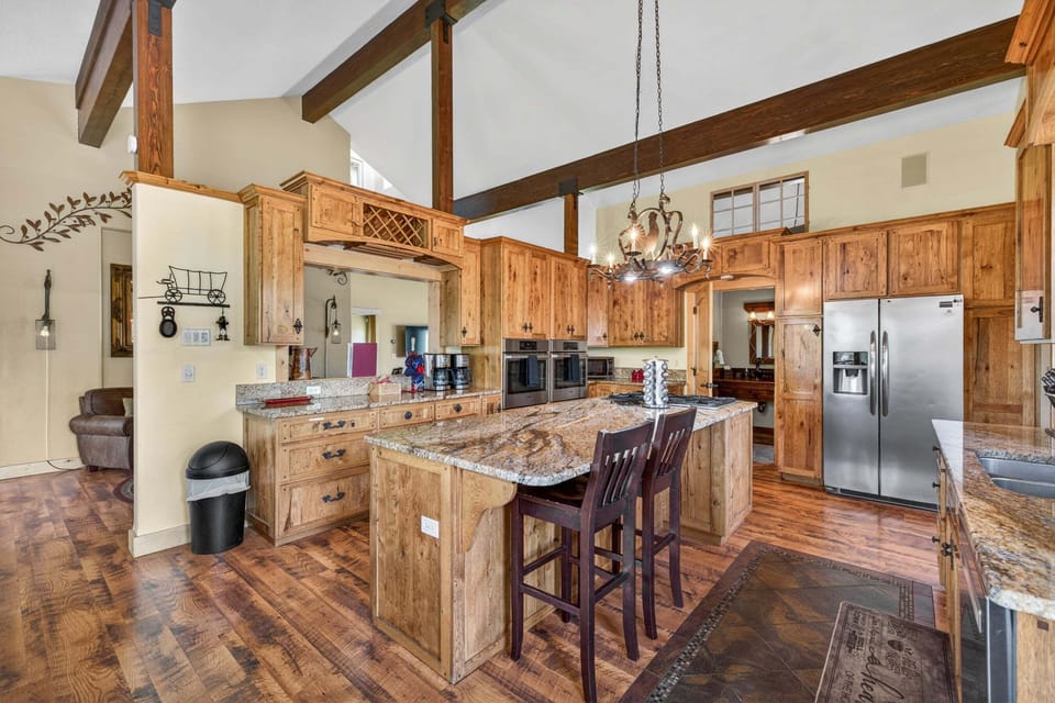 Kitchen main level with window to living room so you're always in the loop
