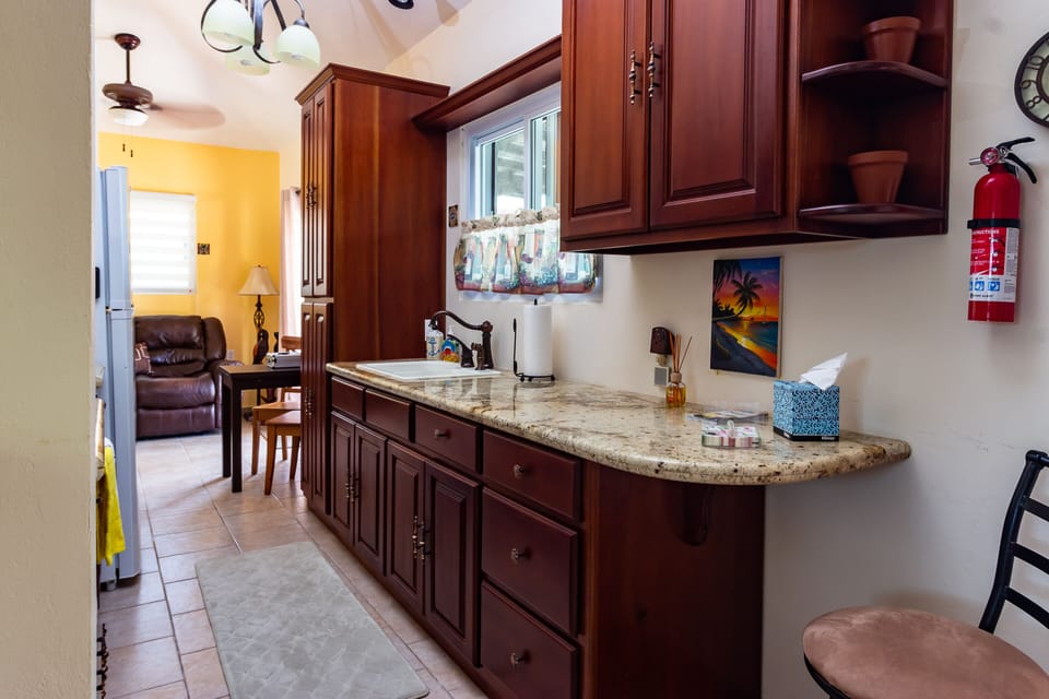 Look at the pool while you do dishes! Enjoy complimentary coffee.