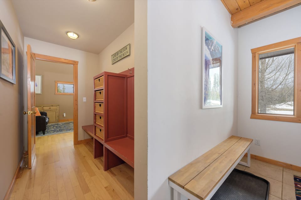 Step into your welcoming mudroom where you can settle in comfortably after mountain adventures.
