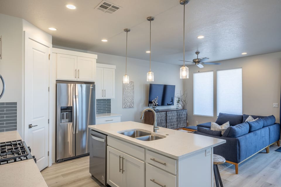 Kitchen - The kitchen is fully stocked with all the dishes, cookware, baking pans, and cutlery you will need for meal preparations and includes stainless steel appliances and granite counter tops.