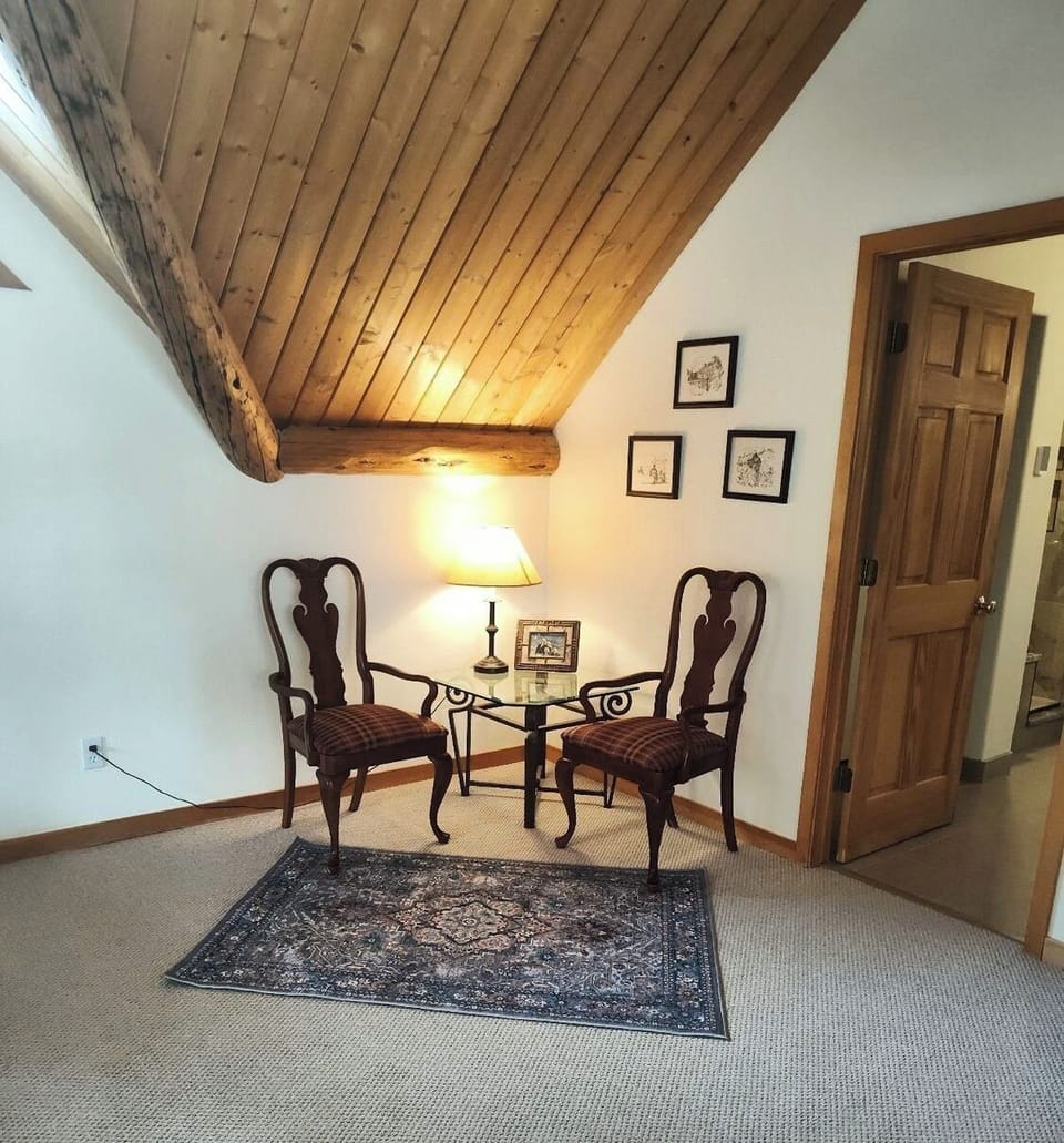 In the master suite there is a corner sitting area to rest, away from the crowd.