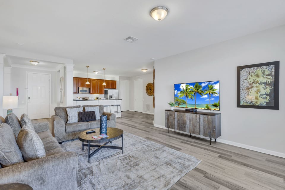 Relaxation Oasis: Sink into the sumptuous sofa, surrounded by stylish accents and warm hues, making this living room a true haven for relaxation