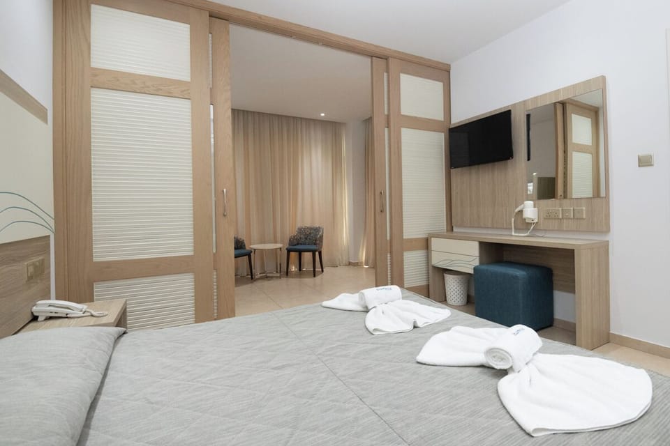 Junior Suite - Family Sea View Room | In-room safe, soundproofing, iron/ironing board, WiFi