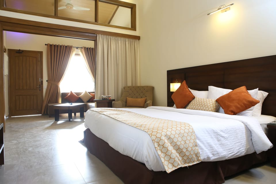 Superior Suite, 1 King Bed, Garden View, Garden Area | Premium bedding, in-room safe, desk, blackout drapes