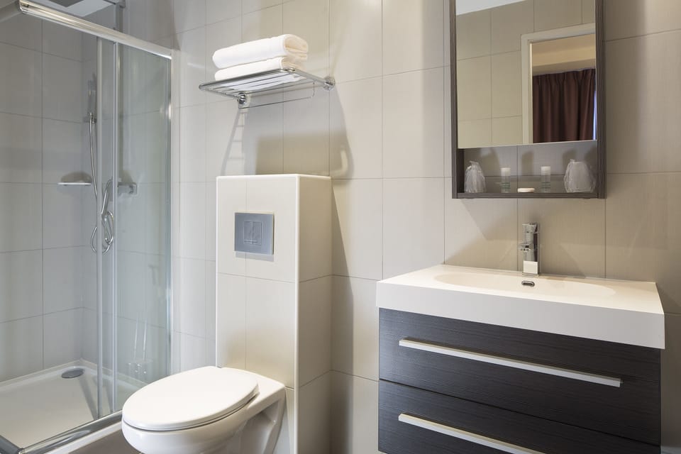 Shower, free toiletries, hair dryer, towels