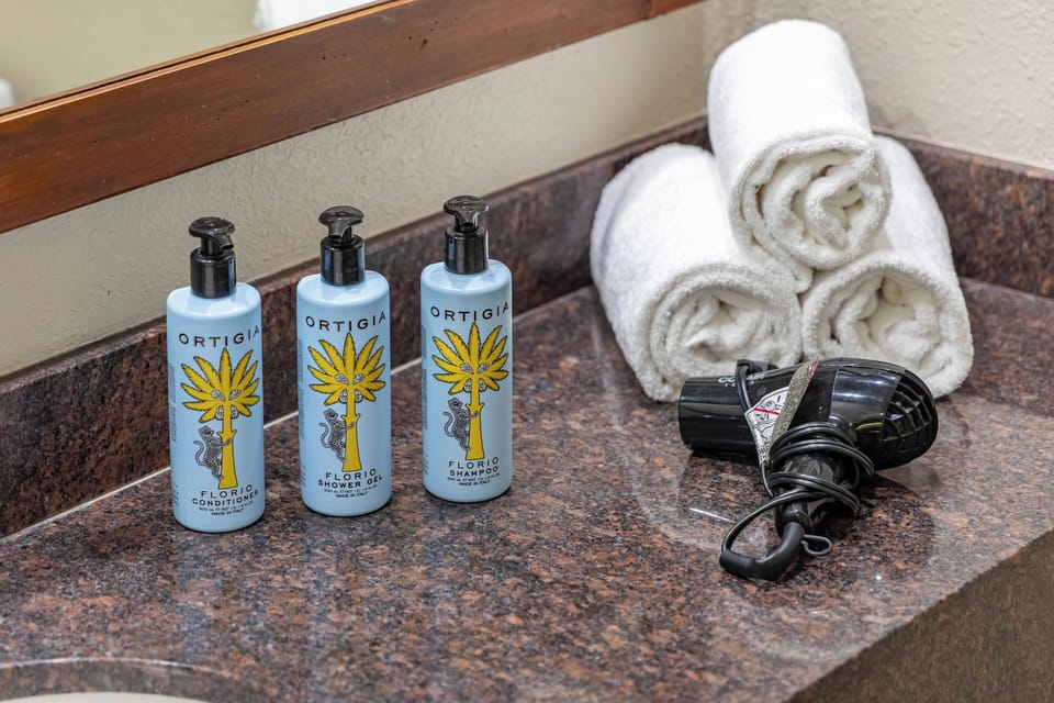 Towels, hair dryer, and soaps included