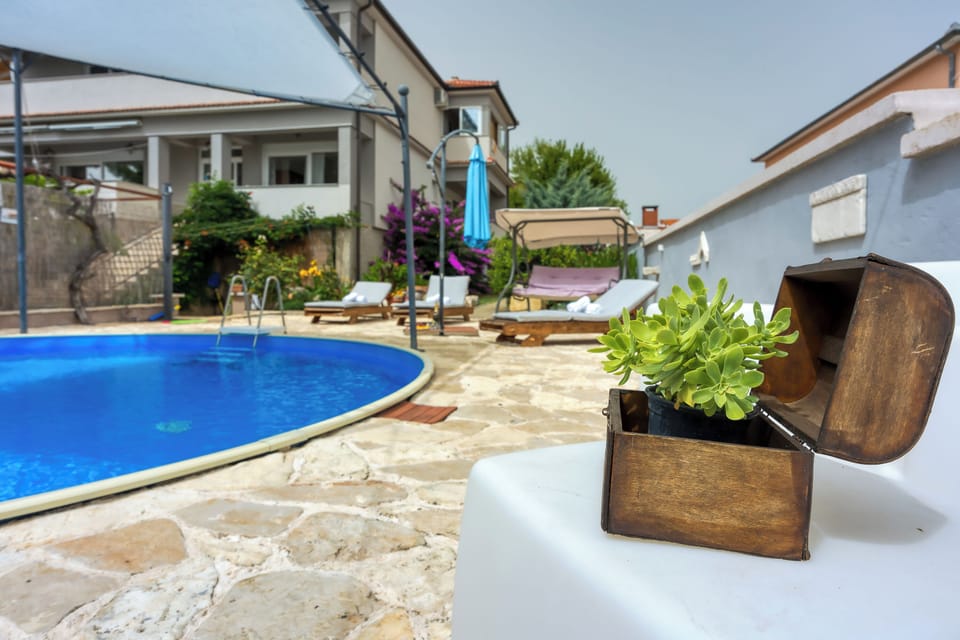 Family Apartment, 3 Bedrooms, 2 Bathrooms (Pool & Garden Apartment Bakija) | Pool | Seasonal outdoor pool