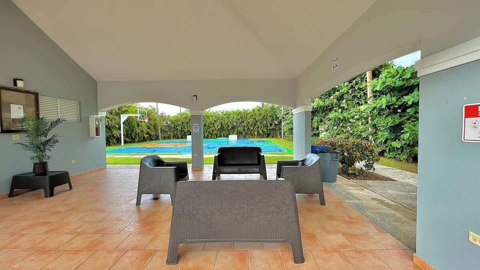 Communal sitting area between community pool and basketball court. 