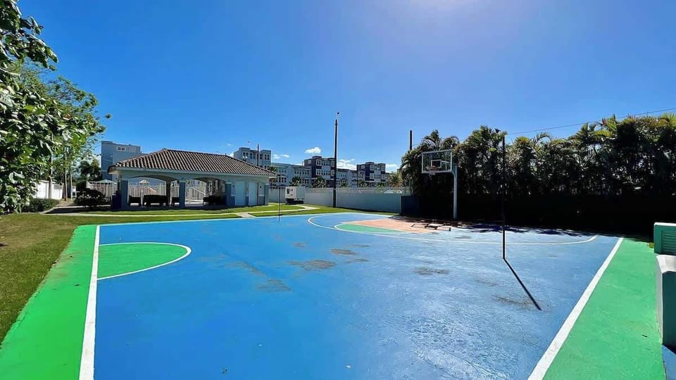 Half basketball court available for residents and guests. 