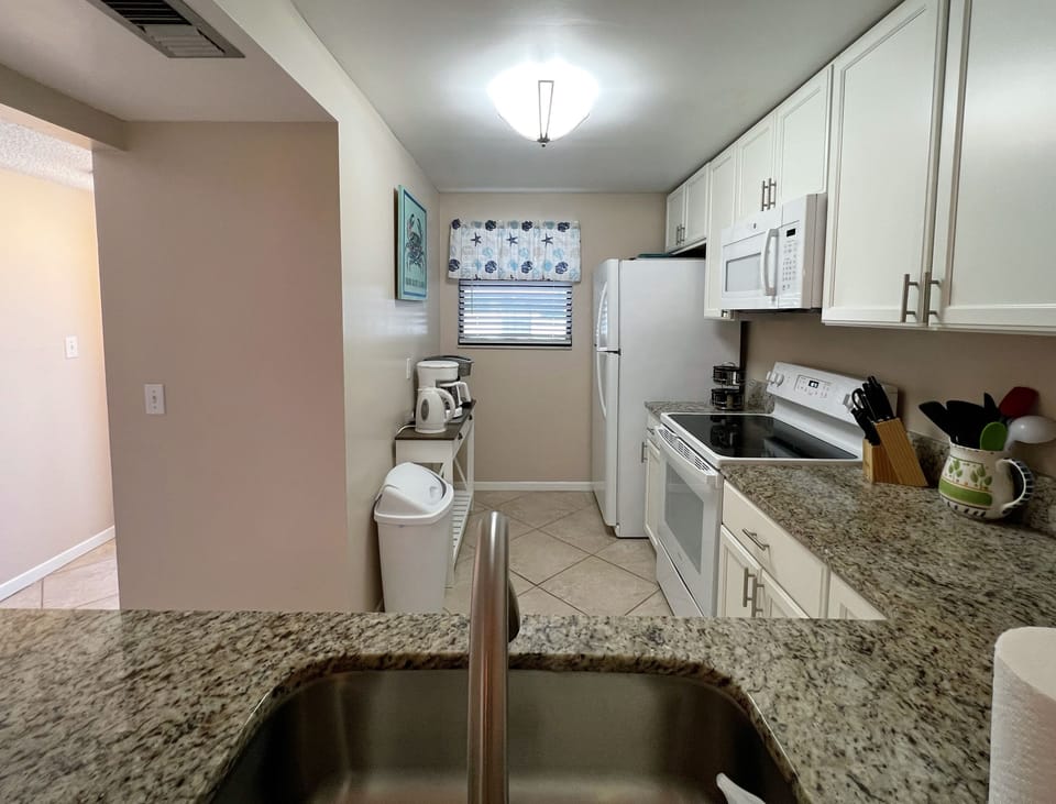 Another view of the kitchen looking from the dining area. - Another view of the kitchen looking from the dining area.