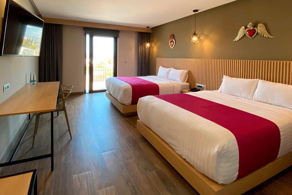 Standard Room, 2 Queen Beds, Non Smoking | Down comforters, in-room safe, desk, blackout drapes