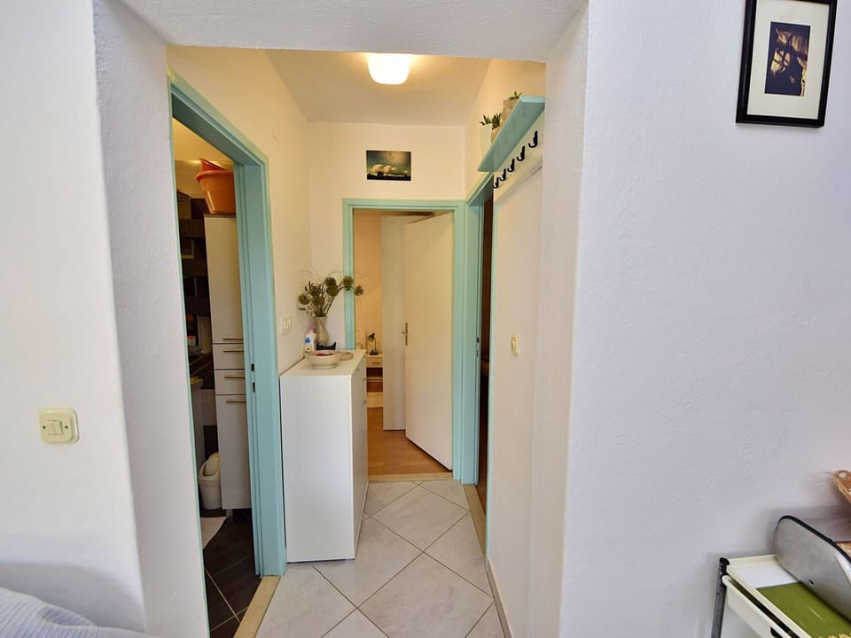 Building, Property, Comfort, Interior Design, Picture Frame, Yellow, Wood, Floor, Wall, Houseplant