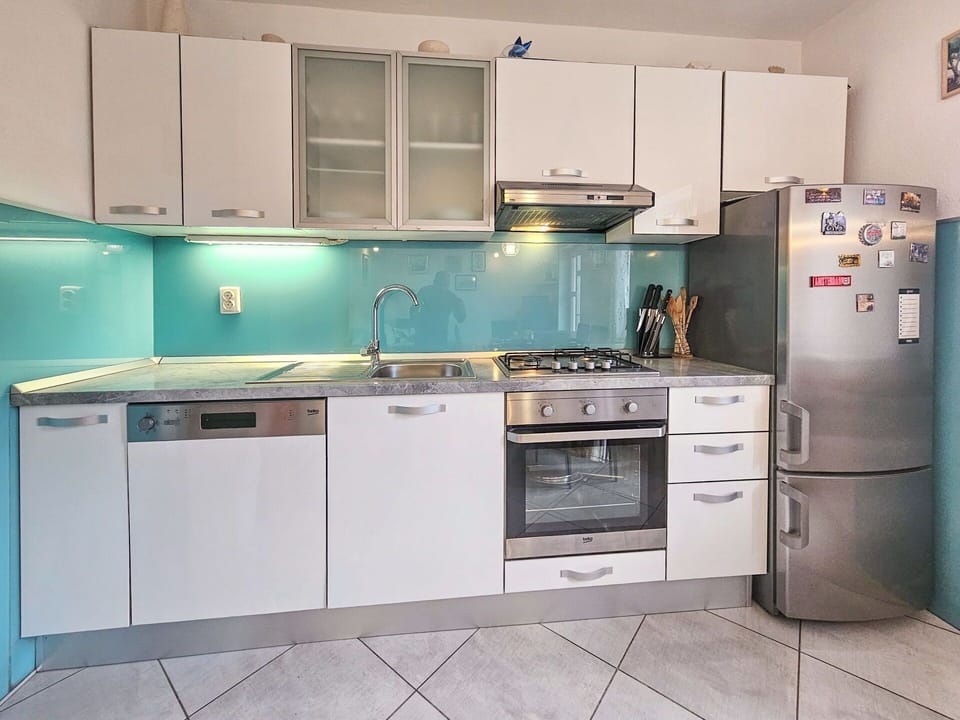 Kitchen Appliance, Kitchen, Countertop, Major Appliance, Cabinetry, Kitchen Stove, Stove, Home Appliance, Kitchen Sink, Interior Design