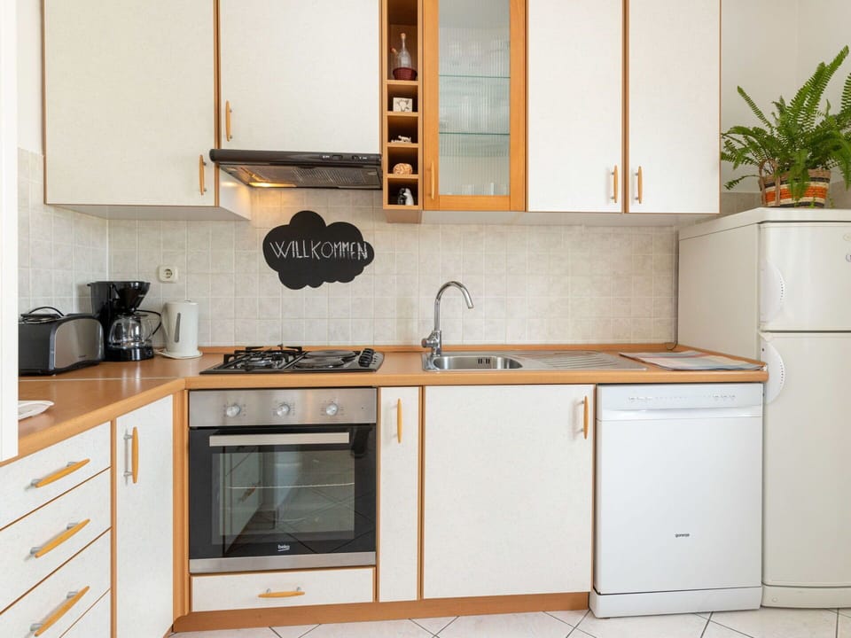 Kitchen, Kitchen Appliance, Countertop, Cabinetry, Major Appliance, Wood, Furniture, Interior Design, Room, Home Appliance