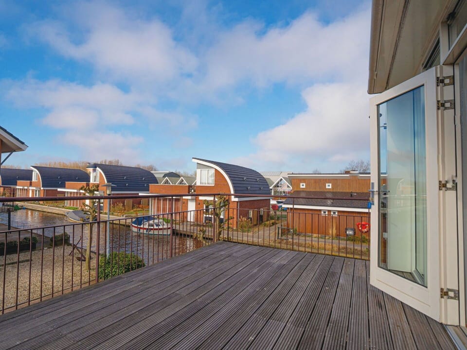 Composite Material, Door, Deck, Wood Stain, Brick, Hardwood, Daylighting, Balcony, Siding, Houseplant