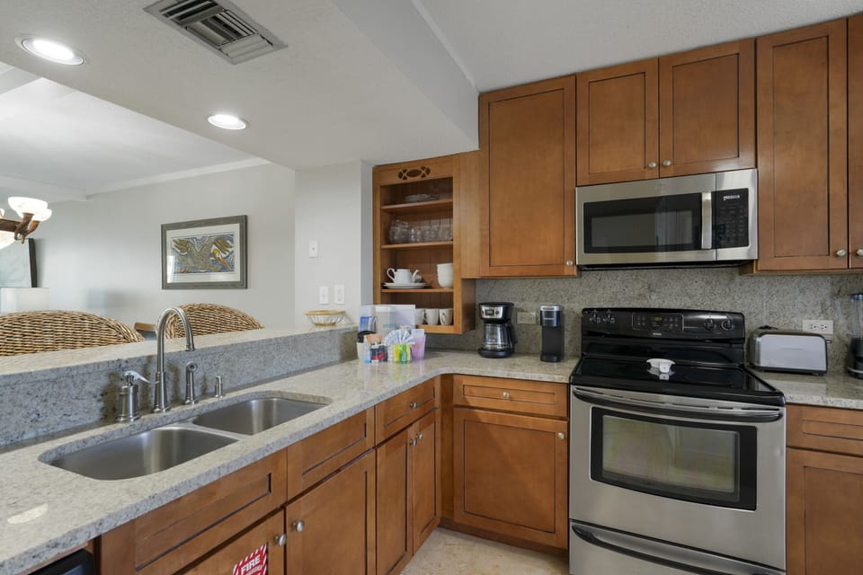 Full kitchen with stainless steel appliances