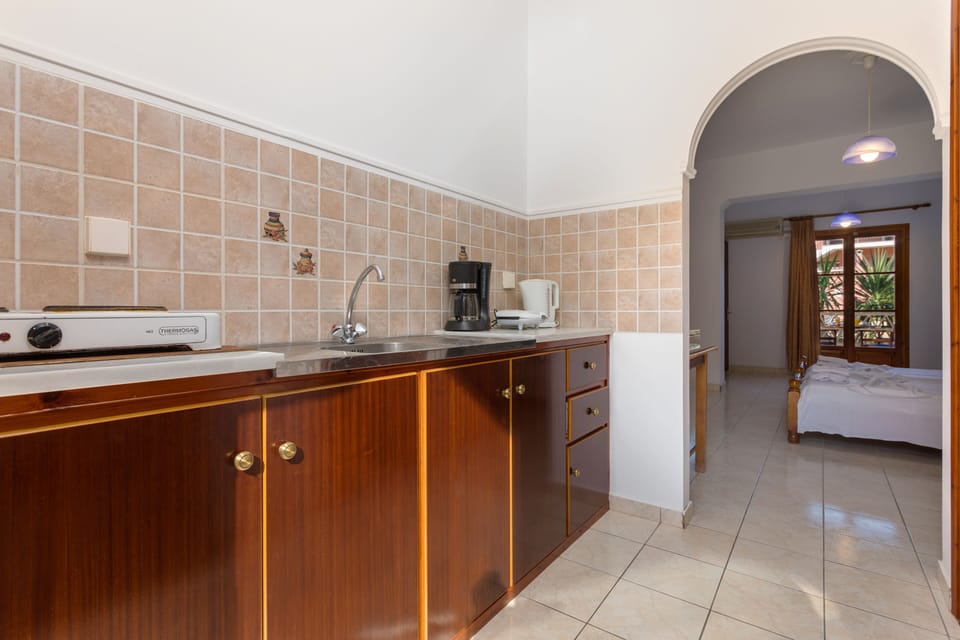 Comfort Apartment | Private kitchenette | Mini-fridge, stovetop, coffee/tea maker, electric kettle