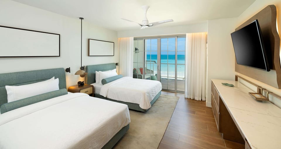 Hypo-allergenic bedding available, minibar, in-room safe