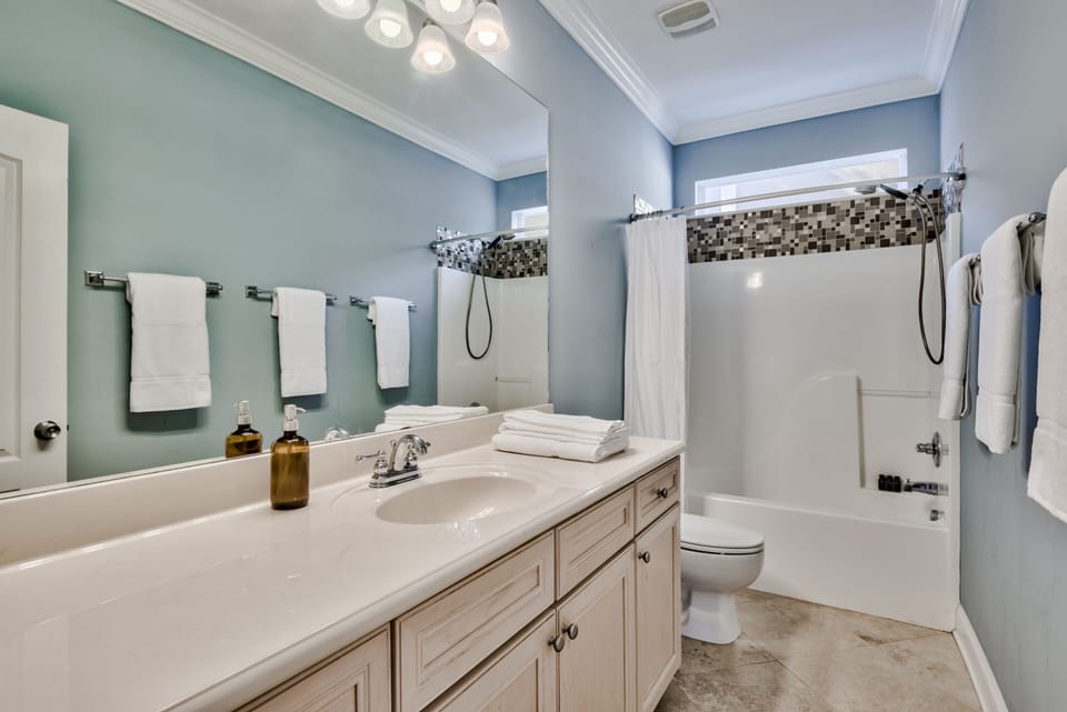 Bathroom 2 is located next to bedroom 2 & 3.