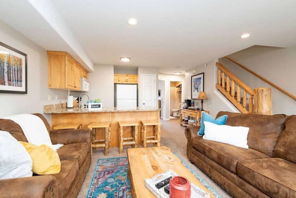 The open-concept living space, facilitates effortless conversation with family and friends.