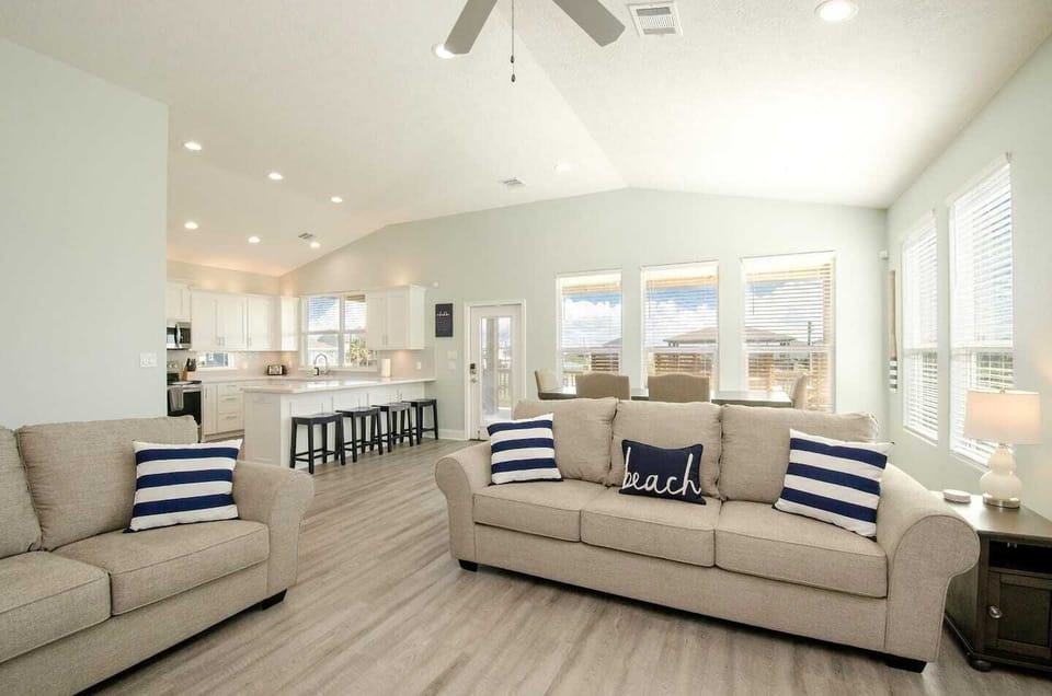 Spacious open-concept living for family time and beachside comfort.
