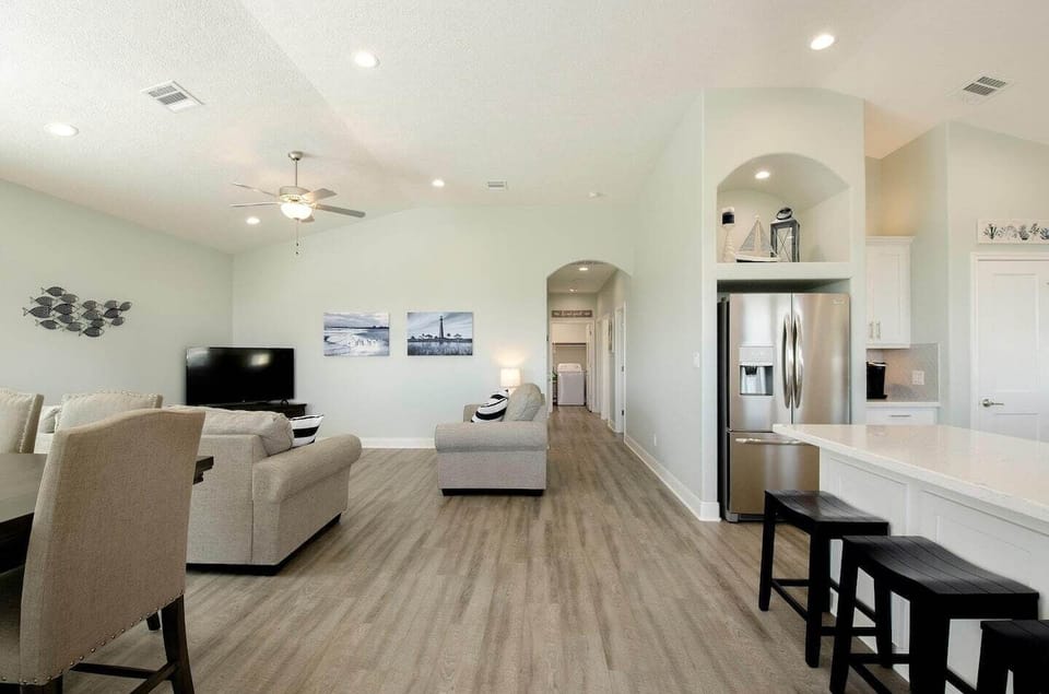 Decorated open-concept home welcomes you with coastal comfort.
