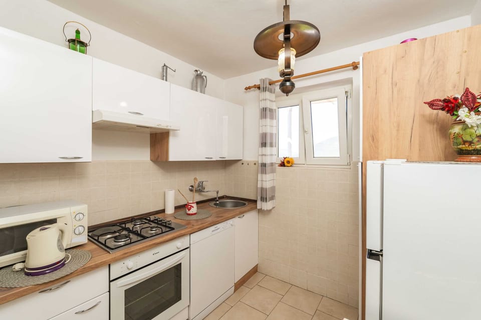 Villa (Three Bedroom Apartment with Terrace ) | Private kitchen | Fridge