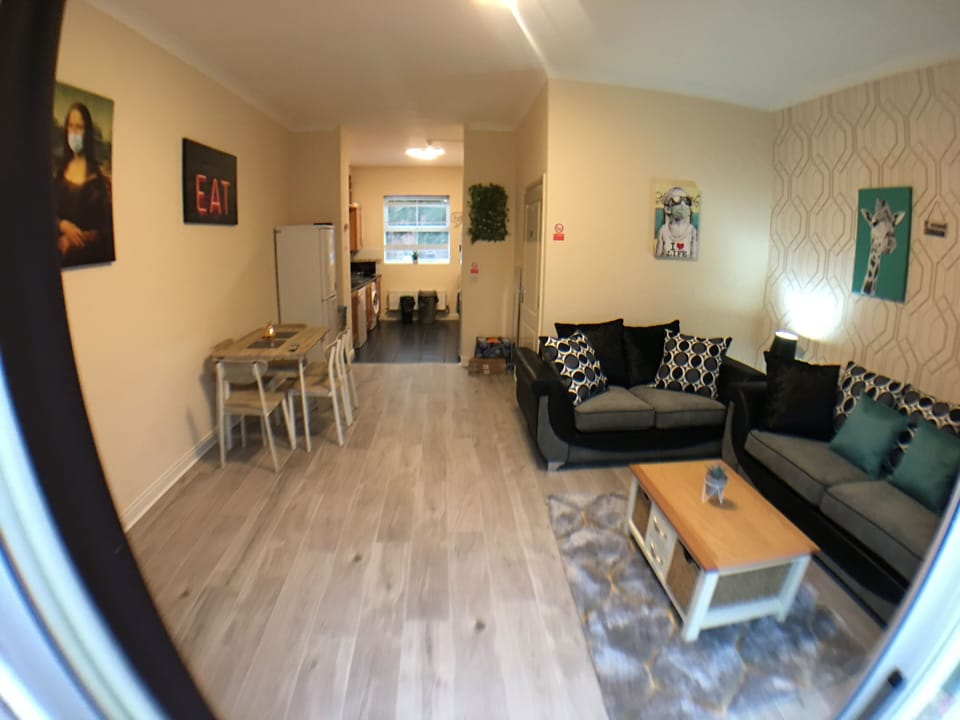 Comfort House | Living area | Flat-screen TV