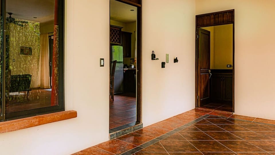 laundry room offers easy access, making laundry chores quick and hassle-free.