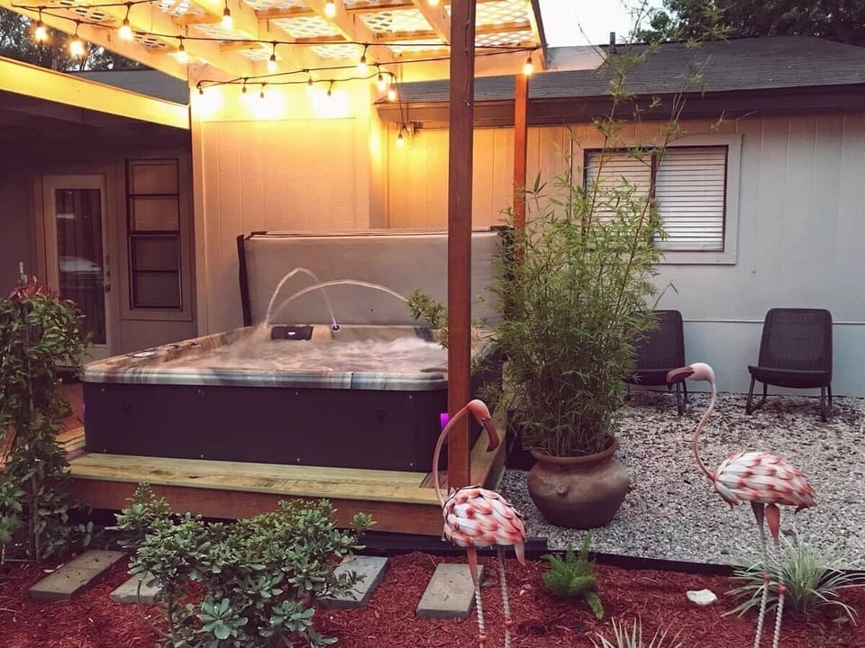 Large hot tub with deck. Good size space to hang out.