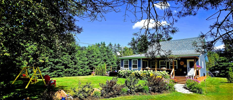 Full view of the cottage from the road.