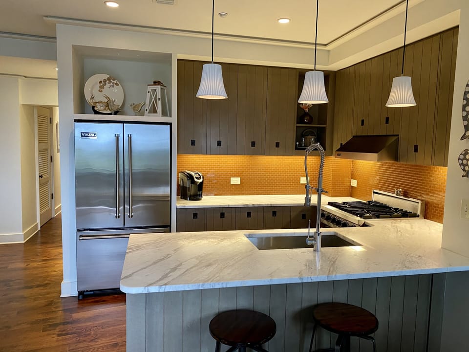 Kitchen with stainless steel appliances 
