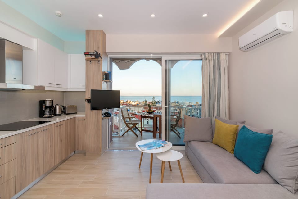 Apartment, 1 Bedroom, Smoking, Balcony | Living area | Books